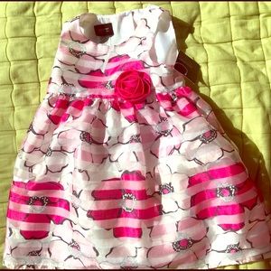 Adorable pattern block dress with pink/red flowers